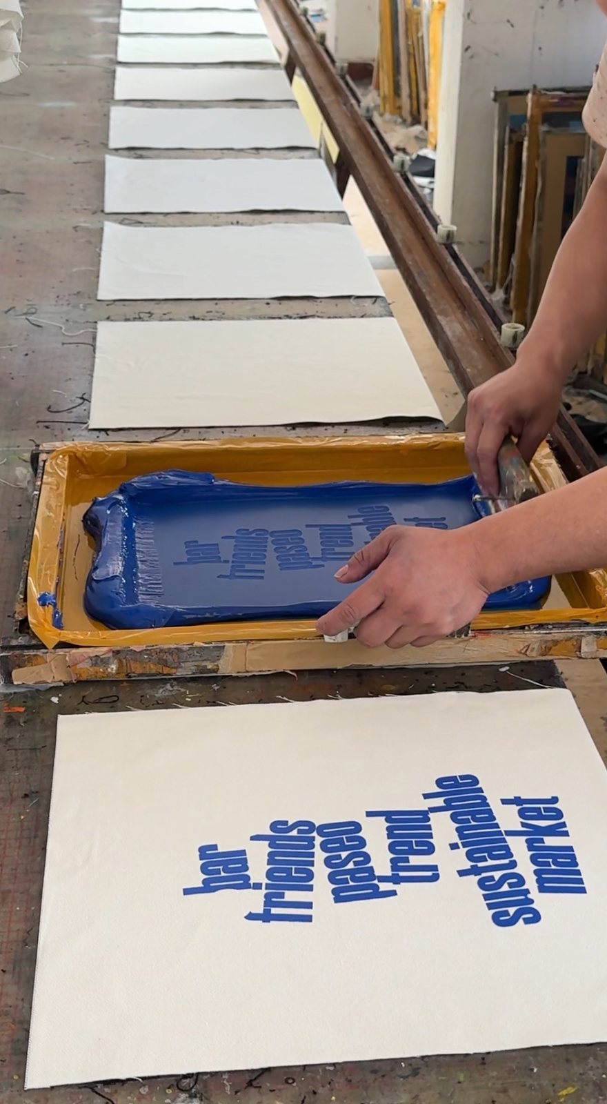 Blue screen printing on custom tote bag fabric